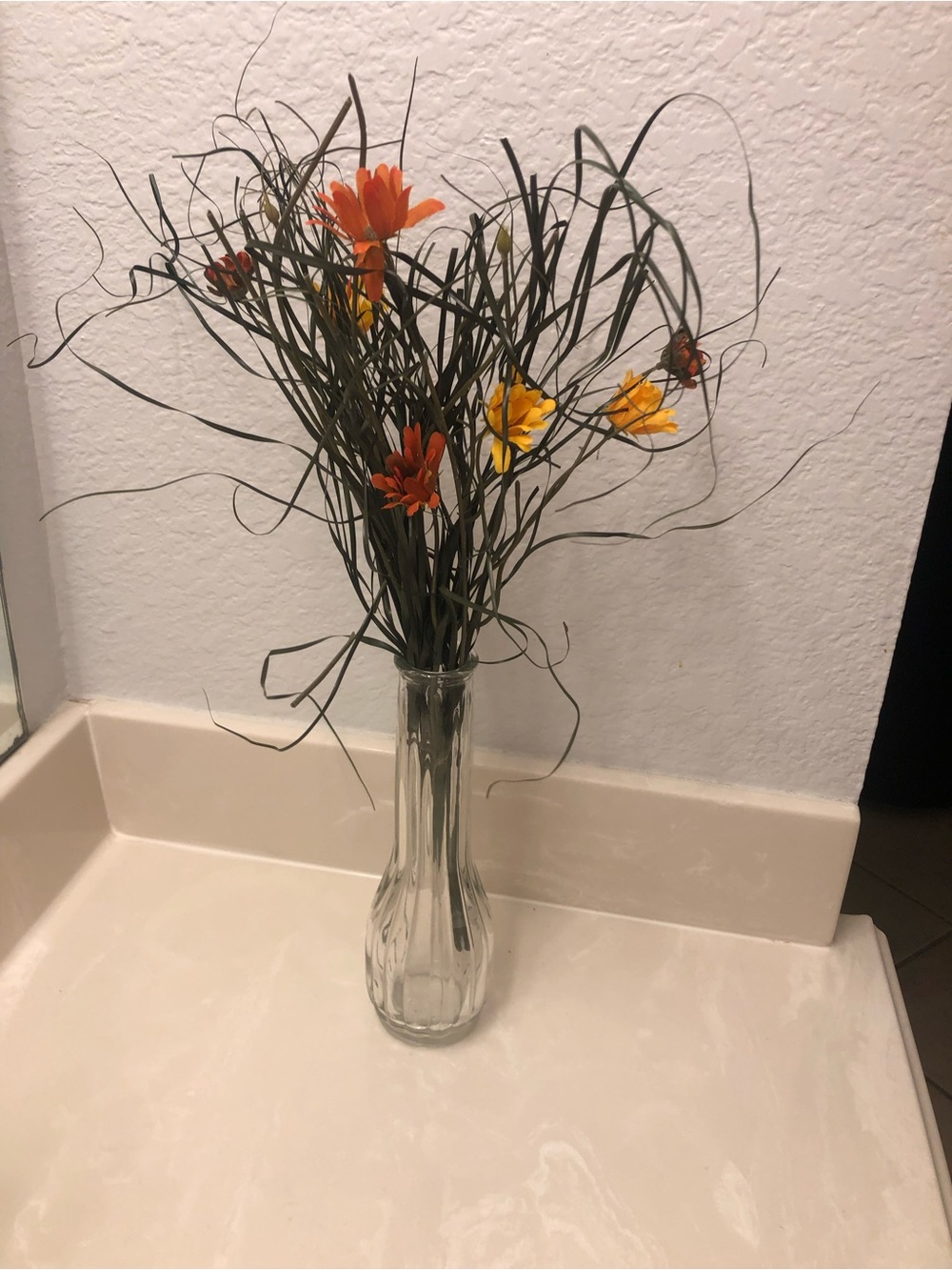 Decorative Orange and Yellow Artificial Flower Bouquet in Clear Glass Vase